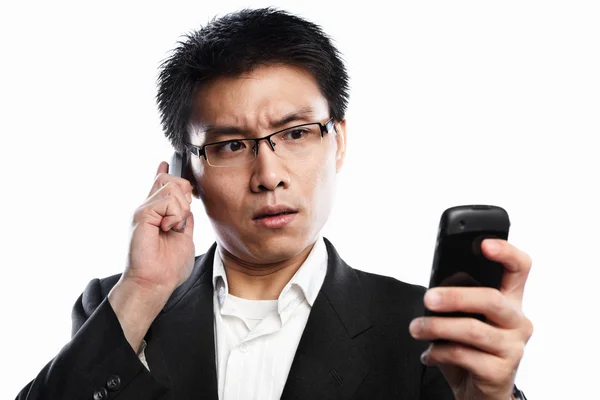 Businessman serious expression when using video call — Stock Photo, Image