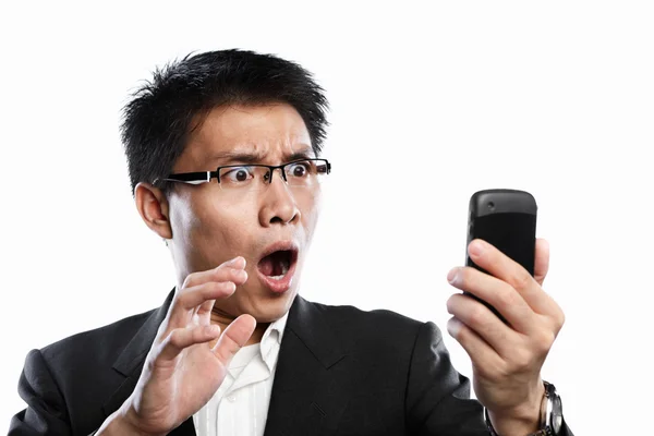 Expressão de choque do empresário ao usar a chamada de vídeo — Fotografia de Stock