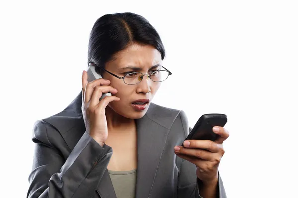 Businesswoman serious expression using video call — Stock Photo, Image