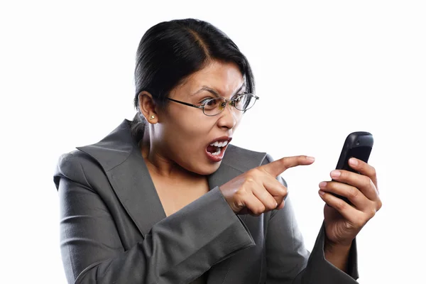 Zakenvrouw boos expressie met behulp van video-oproep — Stockfoto