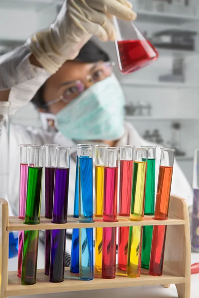 Scientist examining chemical solution — Stock Photo, Image