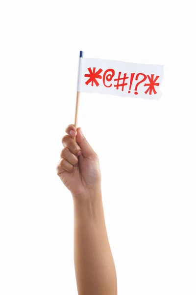 Ruka držící rozzlobený symboly vlajka — Stock fotografie