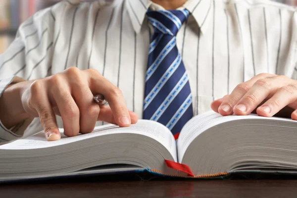 Businessman or professor reading journal — Stock Photo, Image