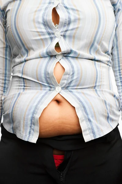 太りすぎの女性の体にタイトなシャツ — ストック写真