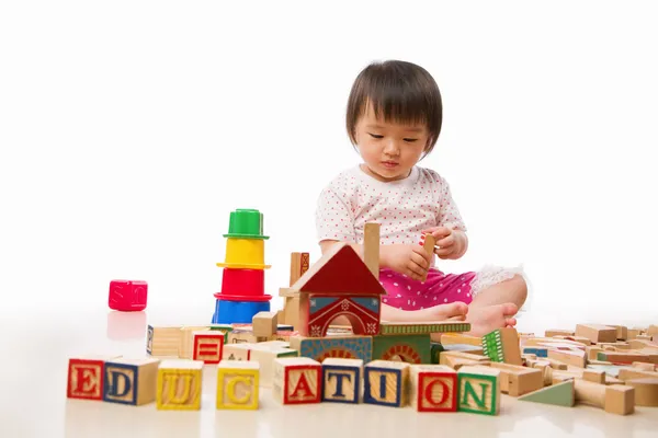 Asian female toddler playing — Stock Photo, Image