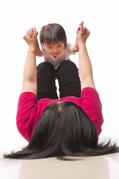 Mãe brincando com sua filha — Fotografia de Stock