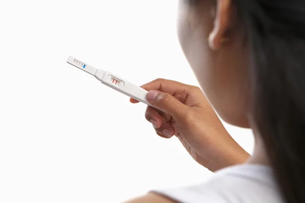 Looking at pregnancy test result — Stock Photo, Image
