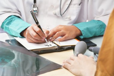 Doctor writing a recipt clipart