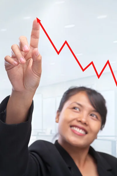 Junge asiatische Geschäftsfrau zeigt mit dem Zeigefinger auf Wachstum gr — Stockfoto