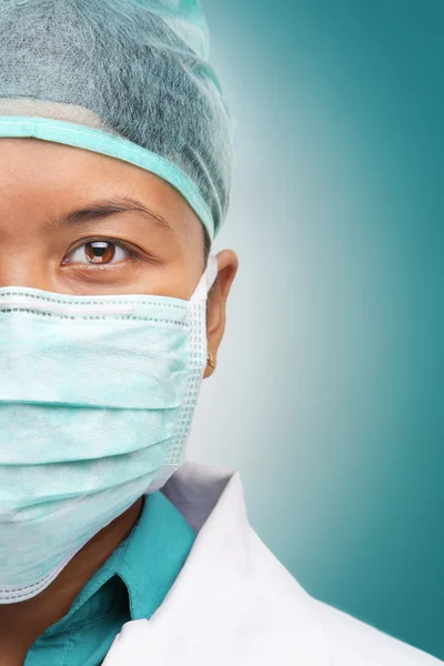 Half face of female doctor — Stock Photo, Image