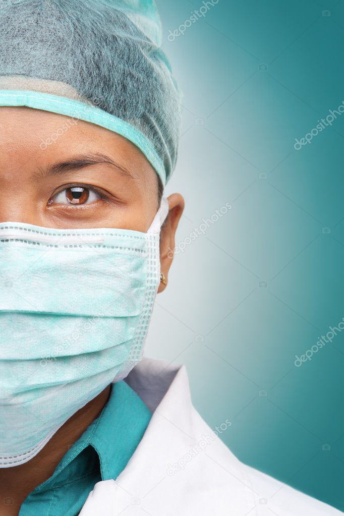 Half face of female doctor