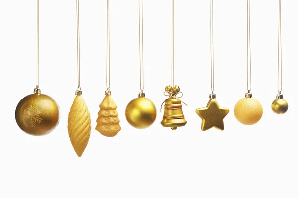 Conjunto dourado de enfeites de Natal — Fotografia de Stock