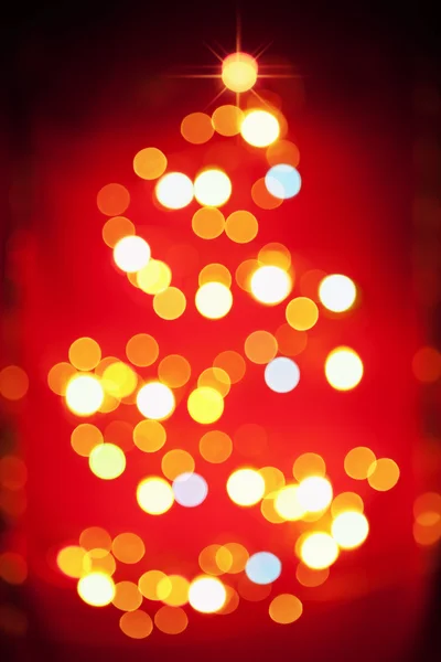 Χριστουγεννιάτικο δέντρο φως μοτίβο στην θαμπάδα — Φωτογραφία Αρχείου