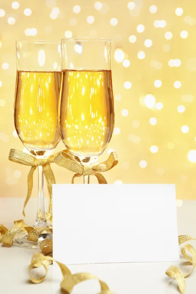 Champagne with blank invitation — Stock Photo, Image