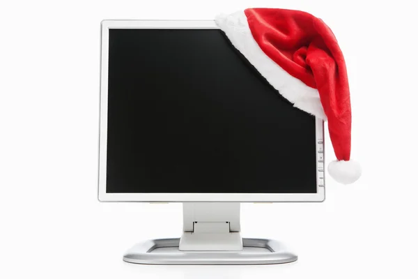 Computer and Santa hat — Stock Photo, Image