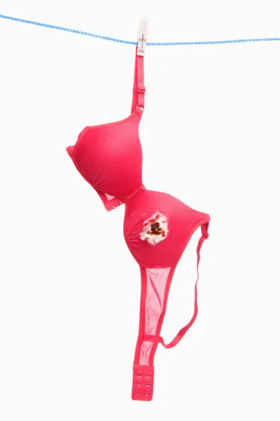 Broken pink bra for breast cancer concept — Stock Photo, Image
