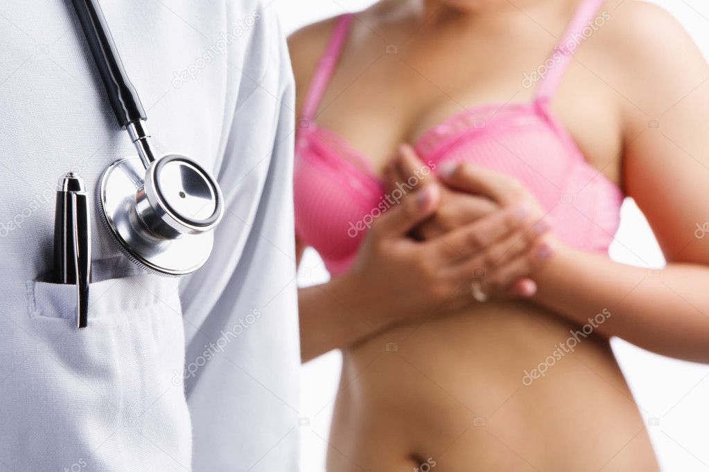Doctor and woman on pink bra