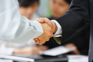 Handshake between employee and boss clipart