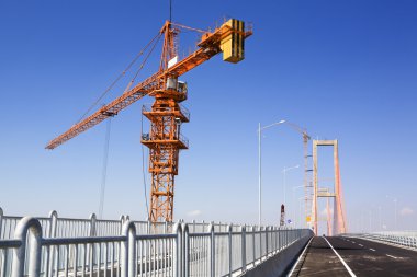 Crane in bridge area clipart