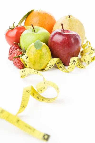 Group fruits with measuring tape — Stock Photo, Image