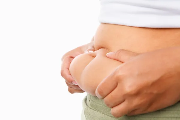 Beliscar gordura na barriga — Fotografia de Stock