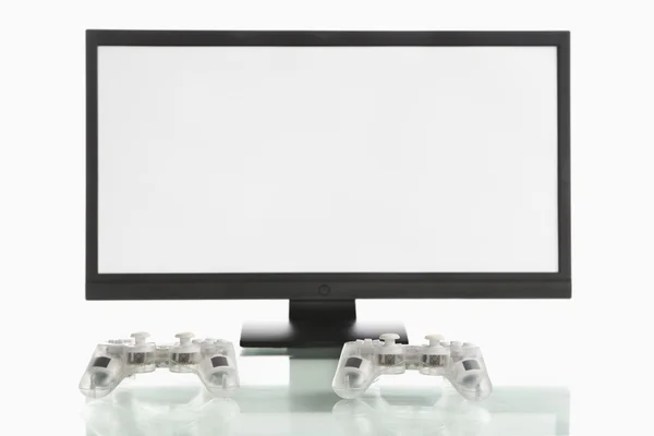Monitor screen and game pads — Stock Photo, Image