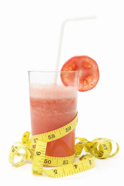 Tomato juice with measuring tape — Stock Photo, Image