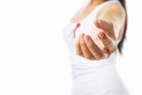 Woman giving her hand to give support for AIDS cause or breast c — Stock Photo, Image