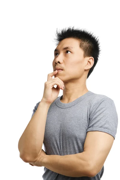 Jovem asiático homem pensando — Fotografia de Stock