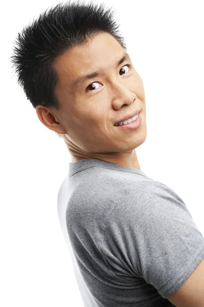 Asian young man looking at camera — Stock Photo, Image