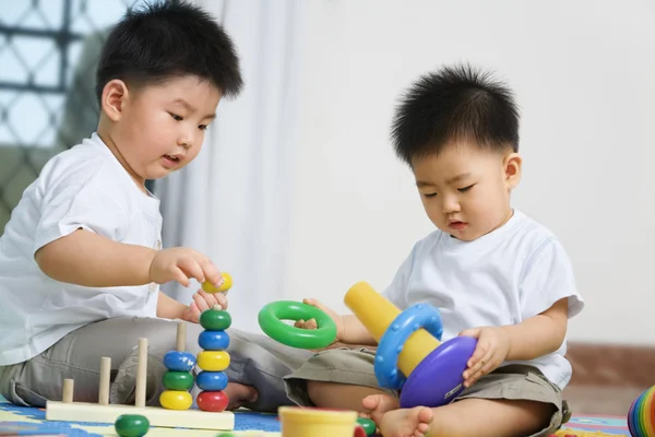 Brothers playing together — Stock Photo, Image