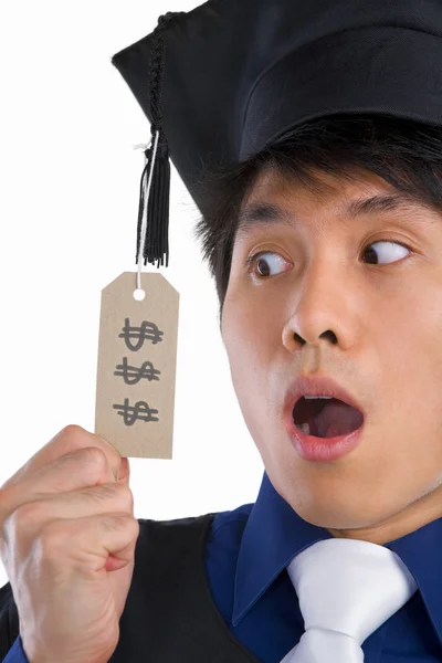 Surprised scholar in expensive education — Stock Photo, Image