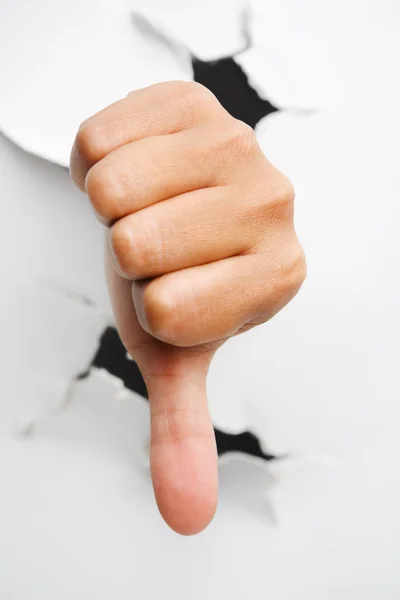 Thumb down from crack wall — Stock Photo, Image
