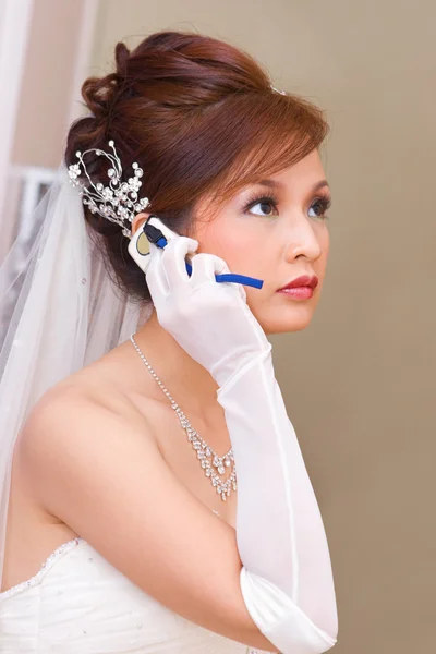 stock image Bride to be talking on cell phone