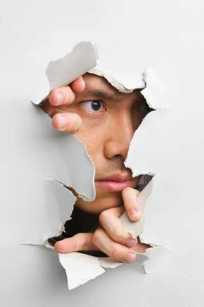Man looking away from cracked wall — Stock Photo, Image