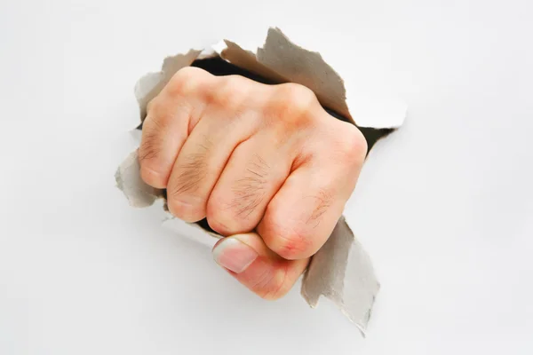 Fist breakthrough white wall — Stock Photo, Image