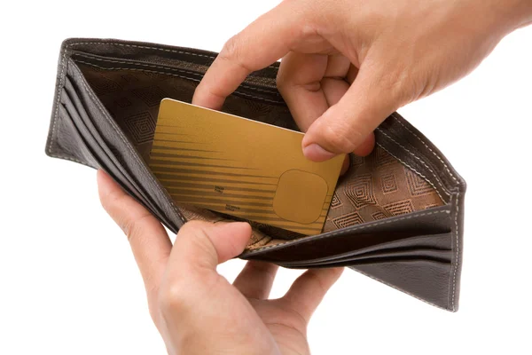 Hand taking gold credit card from wallet — Stock Photo, Image