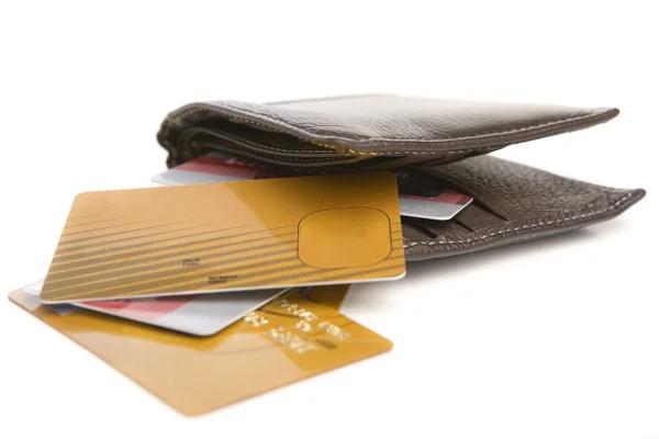 Credit cards scattered around the wallet — Stock Photo, Image