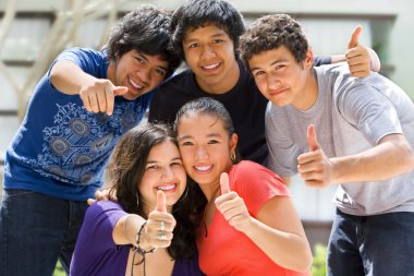 Teenagers posing outside school clipart