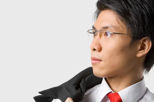 Hombre de negocios asiático mirando hacia otro lado —  Fotos de Stock