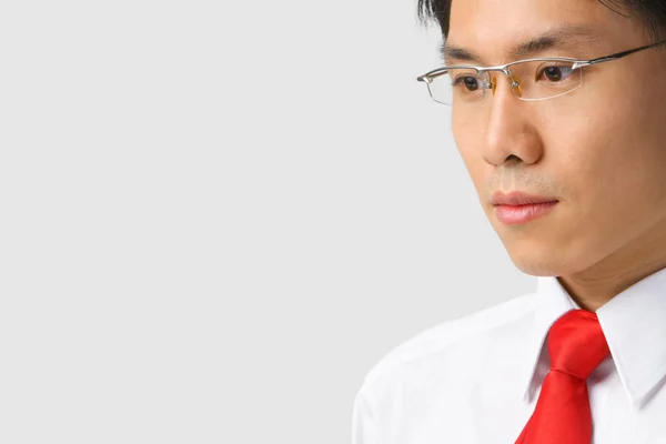 Asian businessman looking away to empty space — Stock Photo, Image