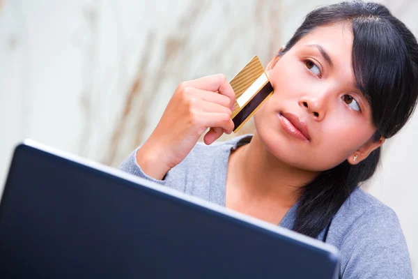 Thinking about using credit card — Stock Photo, Image