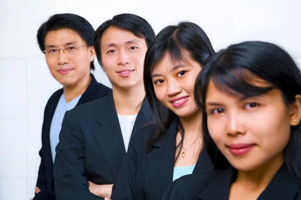 Asian business line up — Stock Photo, Image