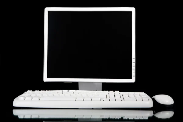 Czołowej komputer biały na czarnym tle — Zdjęcie stockowe