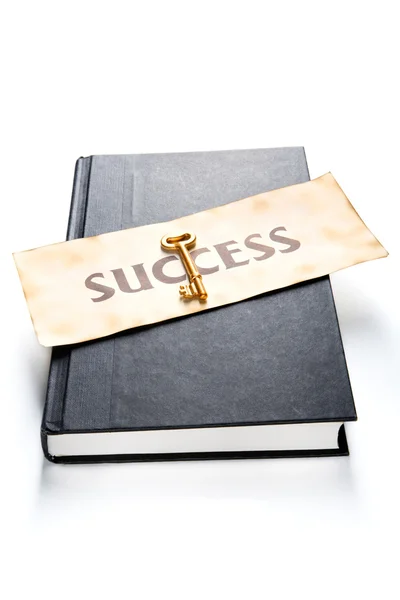 Success golden key on book — Stock Photo, Image