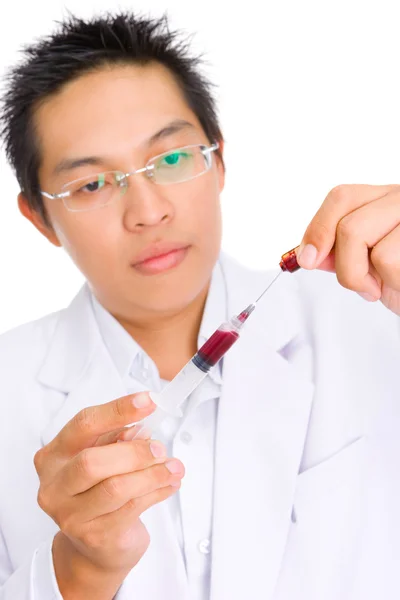 Filling hypodermic syringe from ampoule — Stock Photo, Image