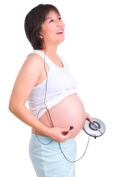 Těhotenství série - poslech hudby — Stock fotografie
