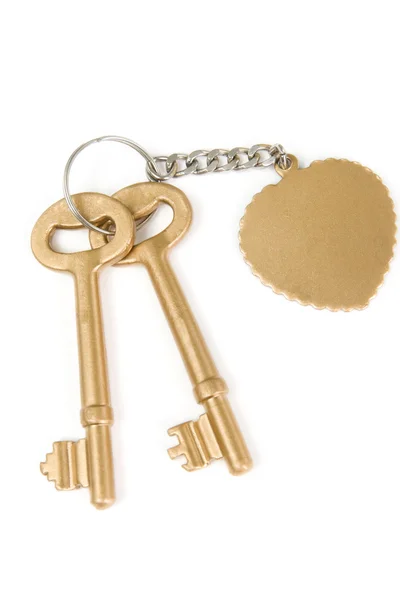 Golden key series - with heart emblem on white — Stock Photo, Image
