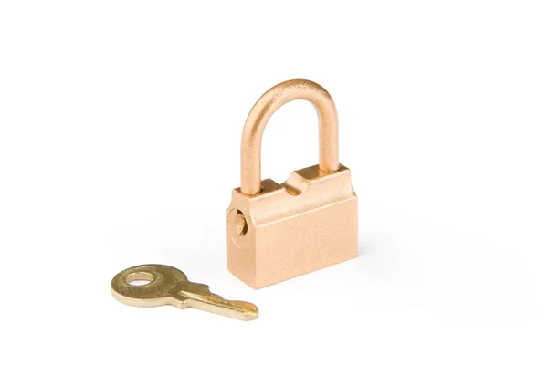 Golden security padlock and key — Stock Photo, Image
