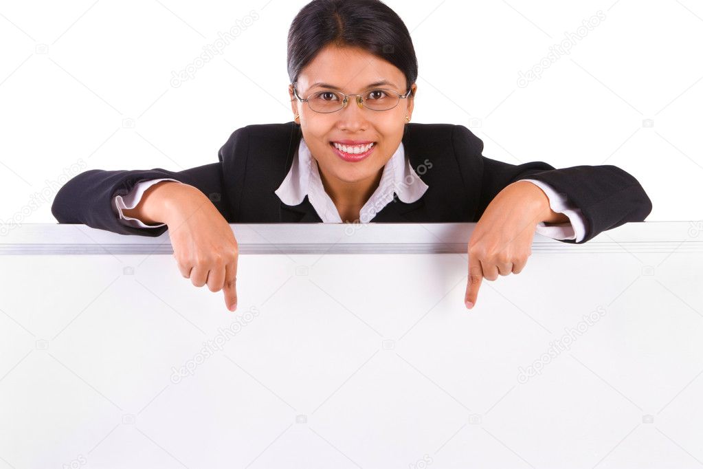 Business woman pointing to the whiteboard